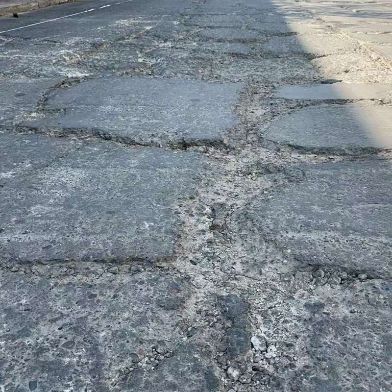 文圣路面起砂露石子修补料